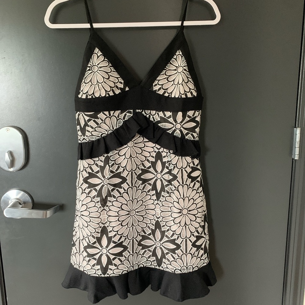 Patterned black mini dress (S)